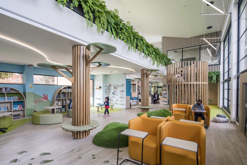 Forest themed CREA Library at Newman School in Colombia