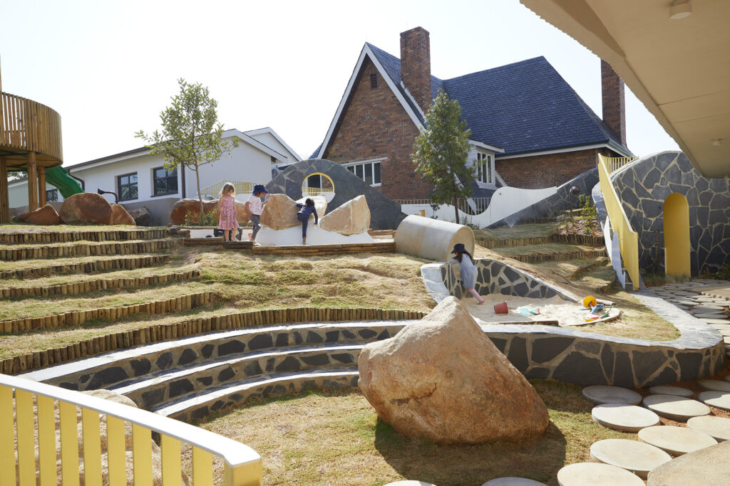 Parks with boulders, stepped seating and open space on the periphery of Redhill ELC