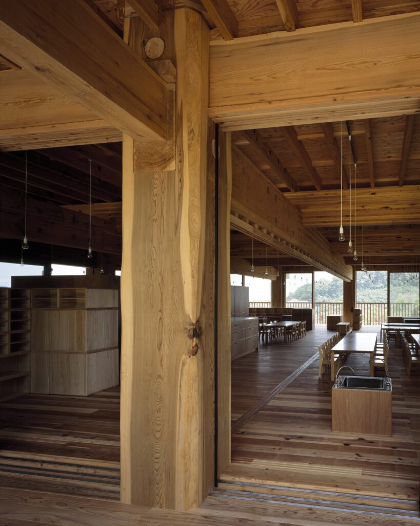 Giant wooden column at ASAHI Kindergarten, Japan by Tezuka Architects