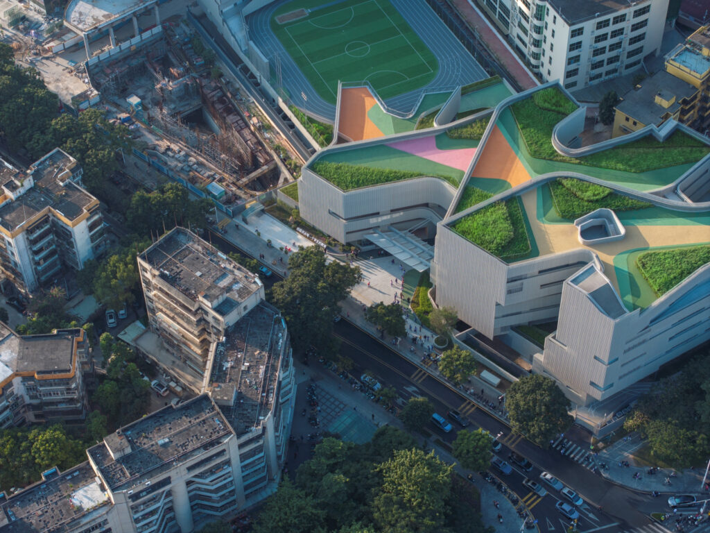 Aerial view of the school’s northwest urban entry space and public plaza, showing how the massing creates a strong civic presence
