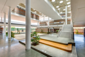 Wide-angle view of the covered central gathering space that runs through the entire length of the building.