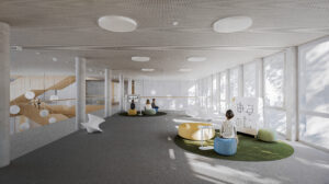 An open common space with circular seating pods and a mobile whiteboard, designed for informal learning and student socialization
