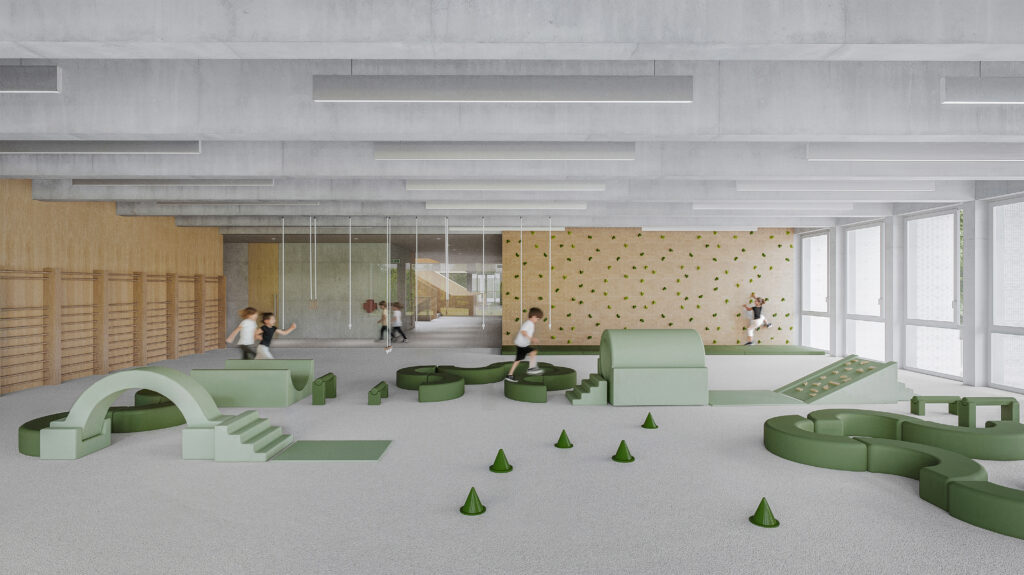 An indoor play space featuring a climbing wall and modular green foam blocks for physical activity and play