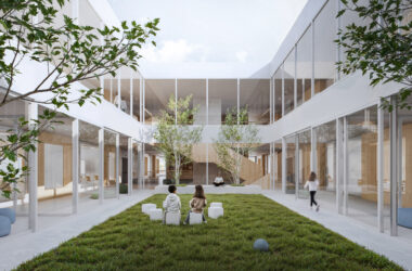 A rectangular outdoor patio at the core of the second floor, featuring a grassy lawn, small trees, and seating benches for relaxation