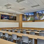 A specialized learning environment featuring multiple screens and workspace for early-stage entrepreneurs in the Lehigh Ventures Lab