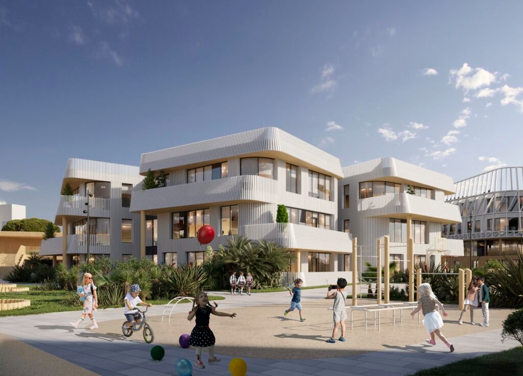 Exterior perspective rendering of an active school playground nestled between modern, multi-story buildings with white vertical slatted screen facades. Young children are running, climbing on frames, and riding a bicycle, while others carry a red balloon. Palm trees and green bushes decorate the landscaped area under a bright, sunny sky.