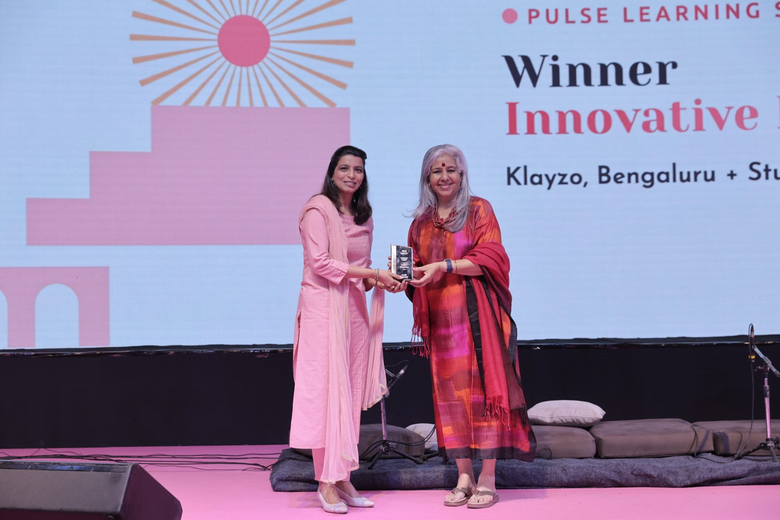 Studio Gudgudee receiving the Innovative Learning Studio award on stage at the PULSE 2026 Gala